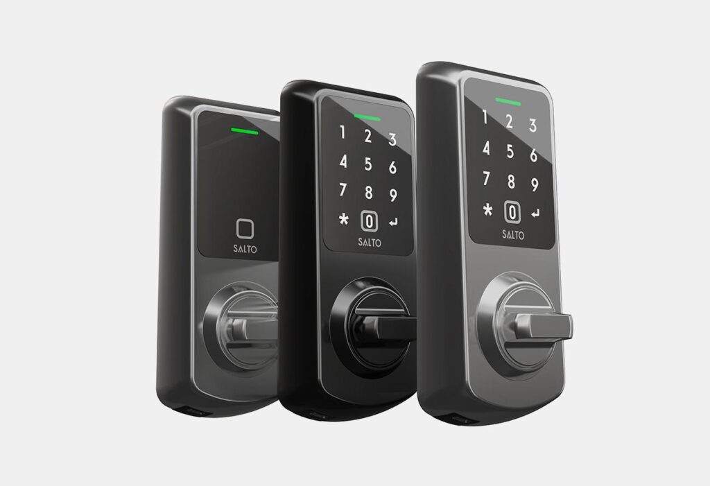 Three black electronic door locks with numeric keypads and turn knobs, branded with "Salto DBolt Touch," are positioned side by side against a white background